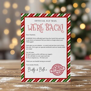 May include: A festive letter from Buddy & Bella, announcing their return. The red and green striped border frames the text "WE'RE BACK!" and elf rules. A "Special Delivery Elf Arrival" stamp is at the bottom.