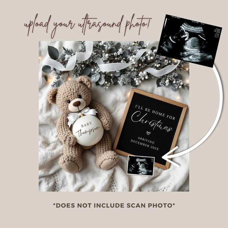 May include: A white ceramic ornament with the text "Baby Thompson" on it, held by a brown teddy bear. A black chalkboard sign with the text "I'll be home for Christmas" and "Arriving December 202X" is on a white blanket with a white ribbon and greenery.