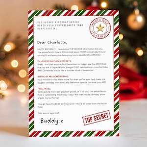 Puede incluir: Una carta de cumpleaños del Polo Norte a Charlotte, con un borde a rayas rojas y verdes. La carta incluye el texto "Top Secret Birthday Report" y un sello "Classified". Firmado por "Buddy x".