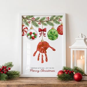 Julklapp med handavtryck att skriva ut, julgranskulor med handavtryck att minnas, julpyssel för barn, konst med handavtryck för småbarn, present till mormor 2026