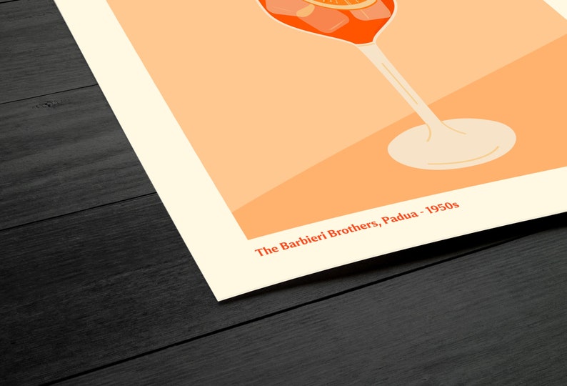 May include: A vintage illustration of an orange drink in a tall glass with a white base. The drink is garnished with orange slices and ice cubes. The text "The Barbieri Brothers, Padua - 1950s" is printed below the glass.