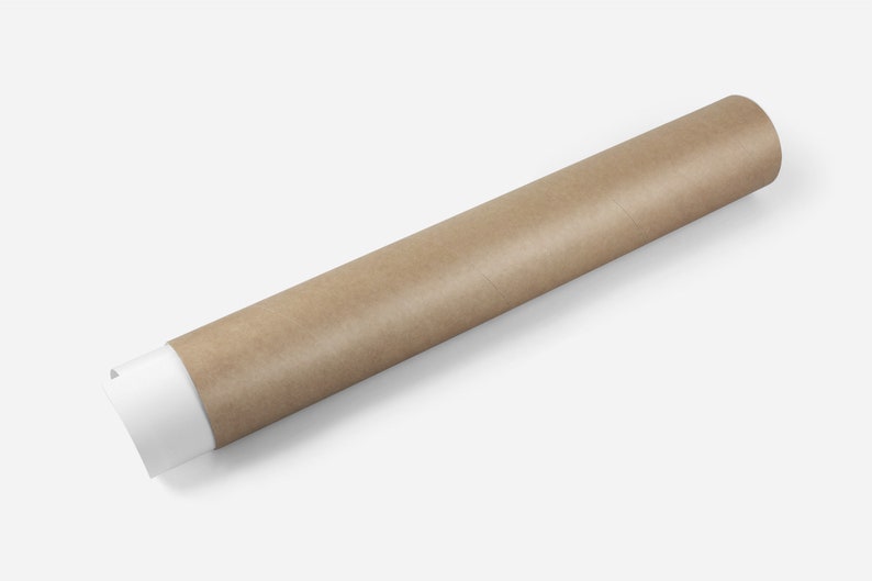 May include: A brown paper tube with a white end cap. The tube is rolled up and lying on a white surface.
