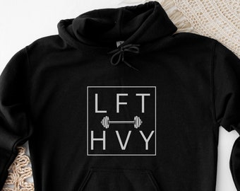 May include: Black hooded sweatshirt with a white graphic that says "LFT HVY" with a barbell in between the words.