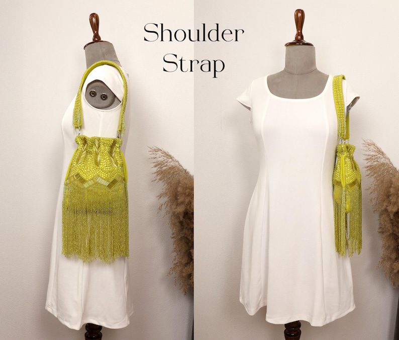 May include: A lime green beaded drawstring handbag featuring a long shoulder strap and a dense fringe of matching beads at the base. The bag is displayed on a mannequin wearing a white dress. The text Shoulder Strap is visible in the image.