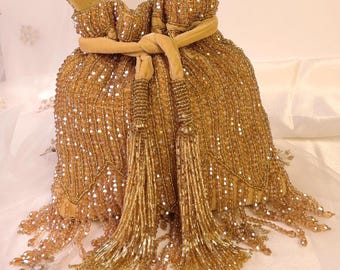 Golden Crystal Potli Bag: Embellished Bridal Handbag with Tassels