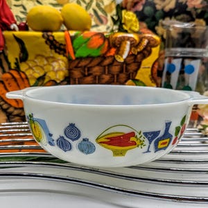 Pyrex Fiesta Milk Glass Casserole Dish Vintage Pyrex Fiesta Casserole dish Shows Mediterranean food  and wine C 1962 - 1968 Stamped 3 1.5 L