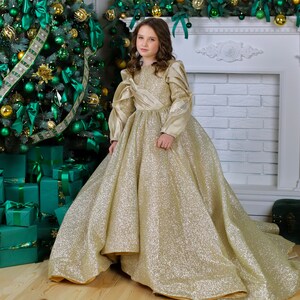 Gold luxury sparkly gown with train and long sleeves