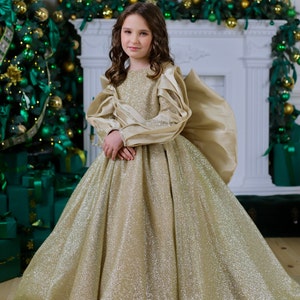 Gold luxury sparkly gown with train and long sleeves