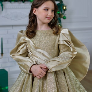 Gold luxury sparkly gown with train and long sleeves