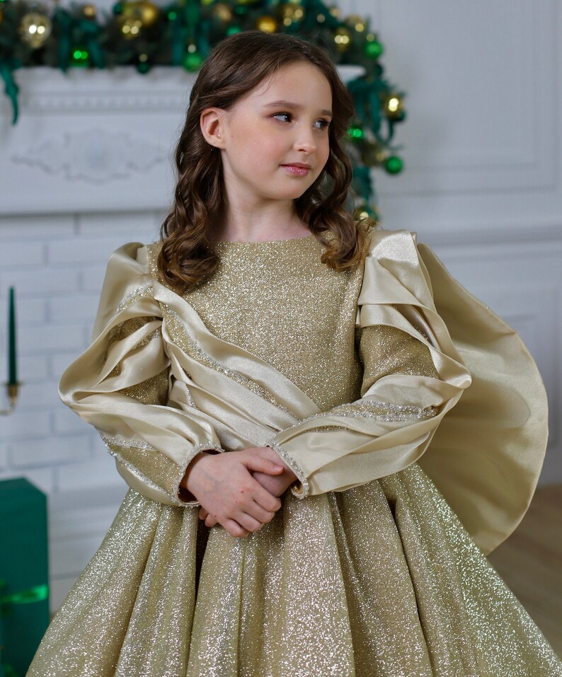 Gold luxury sparkly gown with train and long sleeves