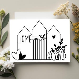 Może przedstawiać: Czarno-biała ilustracja trzech stylizowanych domów z dyniami i sercami. Słowo "HOME" jest wydrukowane na pierwszym domu. Kokarda jest zawiązana na drugim domu. Obraz jest na białym tle.