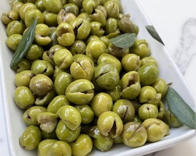 Premium Hatay Seedless Green Olive - Hand Processed by Kırma Method in a Stone Mill - Sedless Olive Showcasing Authentic Flavor and Texture