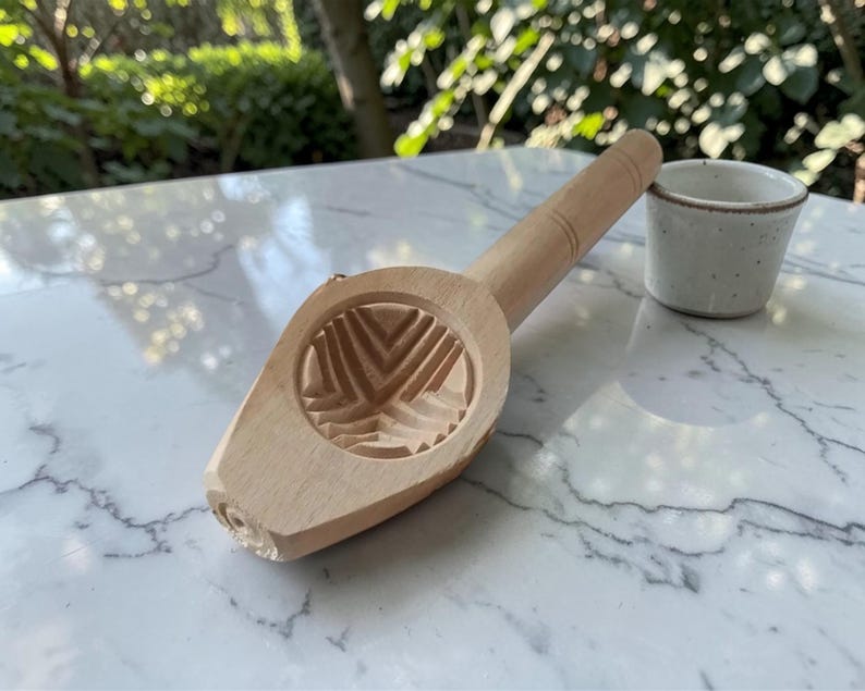 May include: A set of three ceramic mugs with a speckled, matte finish. The mugs are in shades of cream, light brown, and dark brown. Each mug has a simple, minimalist design, perfect for coffee or tea.