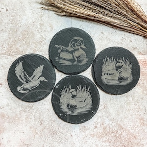 Duck Slate Coasters Set – Laser Engraved Round Drink Coasters – Absorbent Unsealed Stone – Rustic Duck Decor for Hunters or Bird Lovers