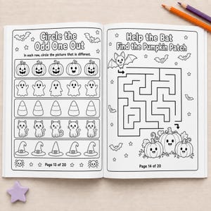 May include: An open activity book with black and white line art pages. The left page features a Circle the Odd One Out game with pumpkins, ghosts, candy corn, cats, and hats. The right page shows a maze titled Help the Bat Find the Pumpkin Patch.