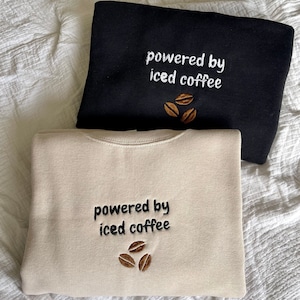 Powered by Iced Coffee Embroidered crewneck sweatshirt, gift for coffee lover, coffee beans black and cream