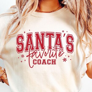 Santa's Favorite Athletic Trainer Funny Christmas Gifts T-Shirt Santa's Favorite Athletic Trainer Funny Christmas Gifts T-Shirt