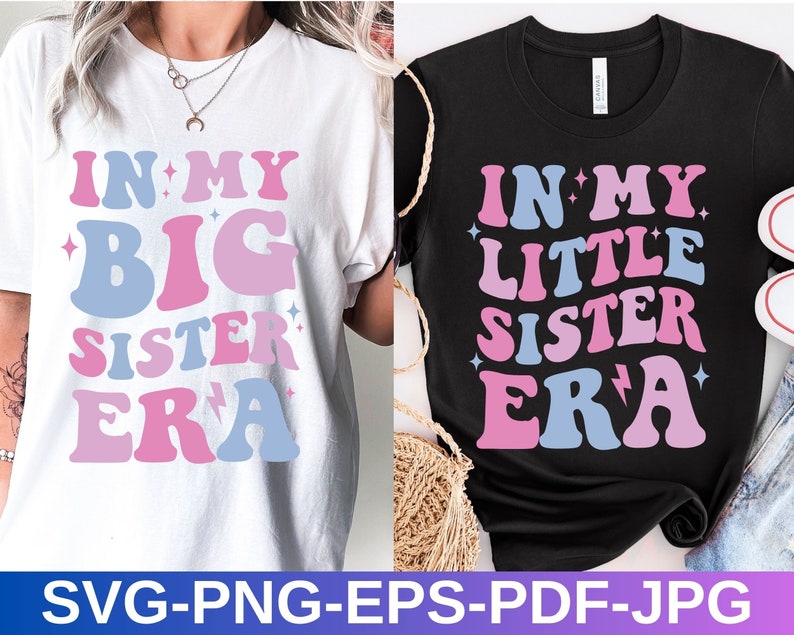 May include: Two t-shirts with a retro-style graphic design. The white t-shirt says "In My Big Sister Era" in pink and blue letters. The black t-shirt says "In My Little Sister Era" in pink and blue letters.