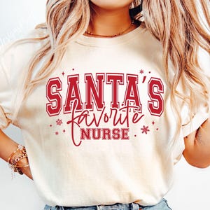 Infirmière préférée du père Noël SVG, SVG infirmière joyeuse, infirmière Noël Svg, infirmière Noël chemise Svg, infirmière Svg, soins infirmiers Svg, infirmière Noël Svg