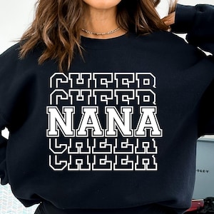 May include: Black sweatshirt with white text that reads "Cheer Cheer Nana Cheer Cheer".