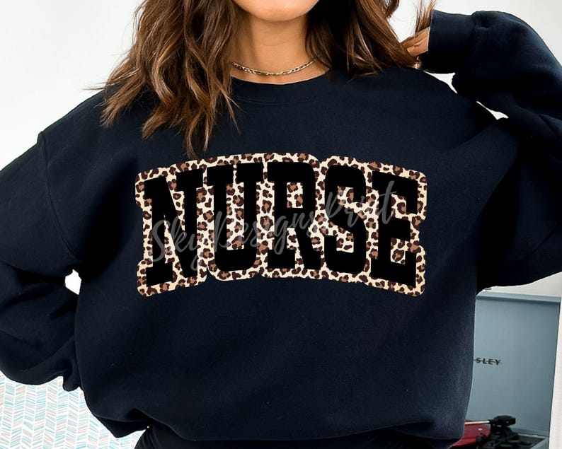 May include: Black sweatshirt with a leopard print "NURSE" graphic.