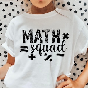 May include: White t-shirt with black text that reads "MATH* =squad +%- "