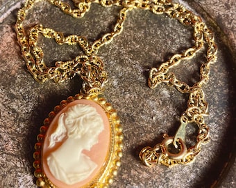 White Ivory Style Peach Base With Bronze Gold Colored Necklace Pendant Vintage