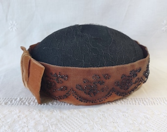 Vintage 1930s Pill-Bottled Cap Crushed Velvet Hat, Black Crinoline Veil, Black Pillbox Hat Deco Style Burnt Orange Band with Crushed Beads.