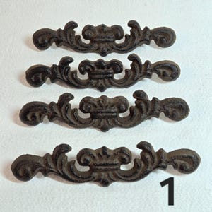 May include: A rustic wooden sign with the text "Welcome to our home" in white lettering. The sign features a distressed finish and a simple, inviting design, perfect for entryway decor.