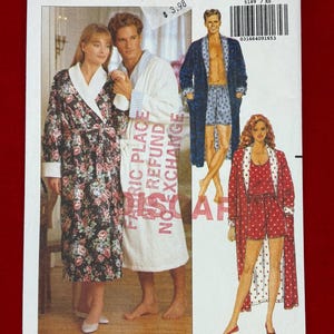 May include: Butterick 5189 sewing pattern envelope featuring illustrations of robes and loungewear. The front shows a floral print robe, a white robe with blue striped trim, a dark blue patterned robe with shorts, and a red polka dot robe with shorts.