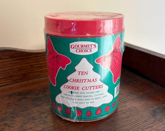 Ensemble vintage de 10 emporte-pièces en plastique pour biscuits de Noël « Gourmet's Choice », dans son emballage d'origine non ouvert.