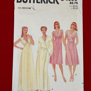 May include: Vintage Butterick sewing pattern 4096. The pattern features illustrations of women's sleepwear designs, including a long gown and a robe in a light yellow color, and two pink dresses. The pattern is size medium.