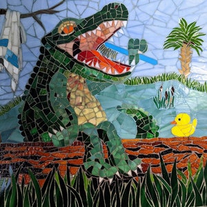 May include: A mosaic artwork depicting a green alligator with an open mouth holding a blue toothbrush. The alligator is sitting on a brown log with green grass in the foreground. A yellow rubber duck is floating in a blue pond in the background.