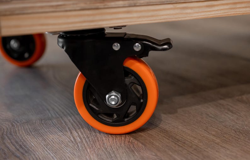Close-up of lock up wheels on charcuterie cart