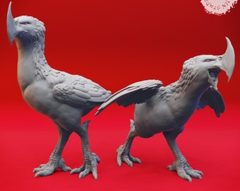 May include: Two gray 3D printed bird figurines with long beaks and wings. The birds are posed in a dynamic stance, one with its wings spread and the other with its head tilted.