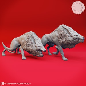 May include: Two light-colored, stylized wolf-like sculptures with detailed fur and open mouths, set against a red background. The sculptures are in a dynamic pose, suggesting movement. The text "- YASASHIIKYOJINSTUDIO -" is at the bottom.
