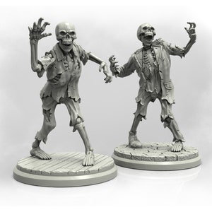 May include: Two grey skeletal figures with tattered clothing, one with a raised arm and the other with both arms raised, standing on circular bases.