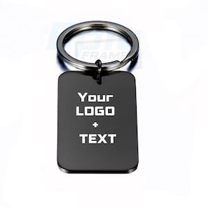 May include: Black metal keychain with a rectangular tag that says "Your Logo + Text".