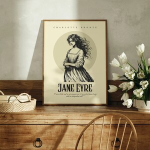 May include: A vintage-style poster featuring a black and white illustration of a woman with long hair, titled "Jane Eyre" by Charlotte Bronte. The poster has a cream background with a circle behind the woman. The quote "I am no bird, and no net ensnares me: I am a free human being with an independent will." is printed below the title.