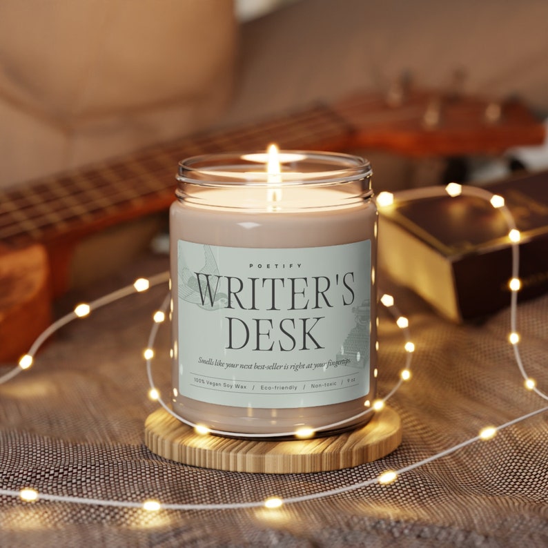 lit writer's desk candle is sitting around the holiday atmosphere