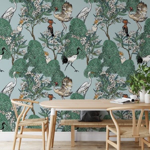 May include: A blue and green wallpaper pattern with white birds, flowers, and leaves. The wallpaper features a repeating pattern of birds, flowers, and leaves.