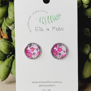 Puces d&#39;oreilles pop fleurs fuscia
