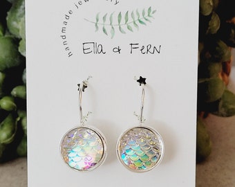 Tienes estos aretes con palanca hacia atrás