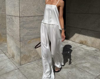Bridal satin pants set with open back top boho white two piece outfit for wedding guest or bridal shower elegant and relaxed look