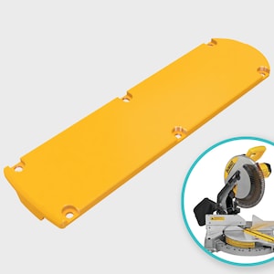 Peut inclure: Extension en plastique jaune pour scie à onglets. L'extension mesure environ 45 cm de long et a une extrémité arrondie. Elle comporte plusieurs trous pour vis de montage.