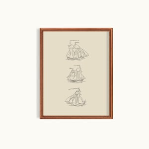 May include: A framed print with a beige background featuring three black and white line drawings of sailing ships.