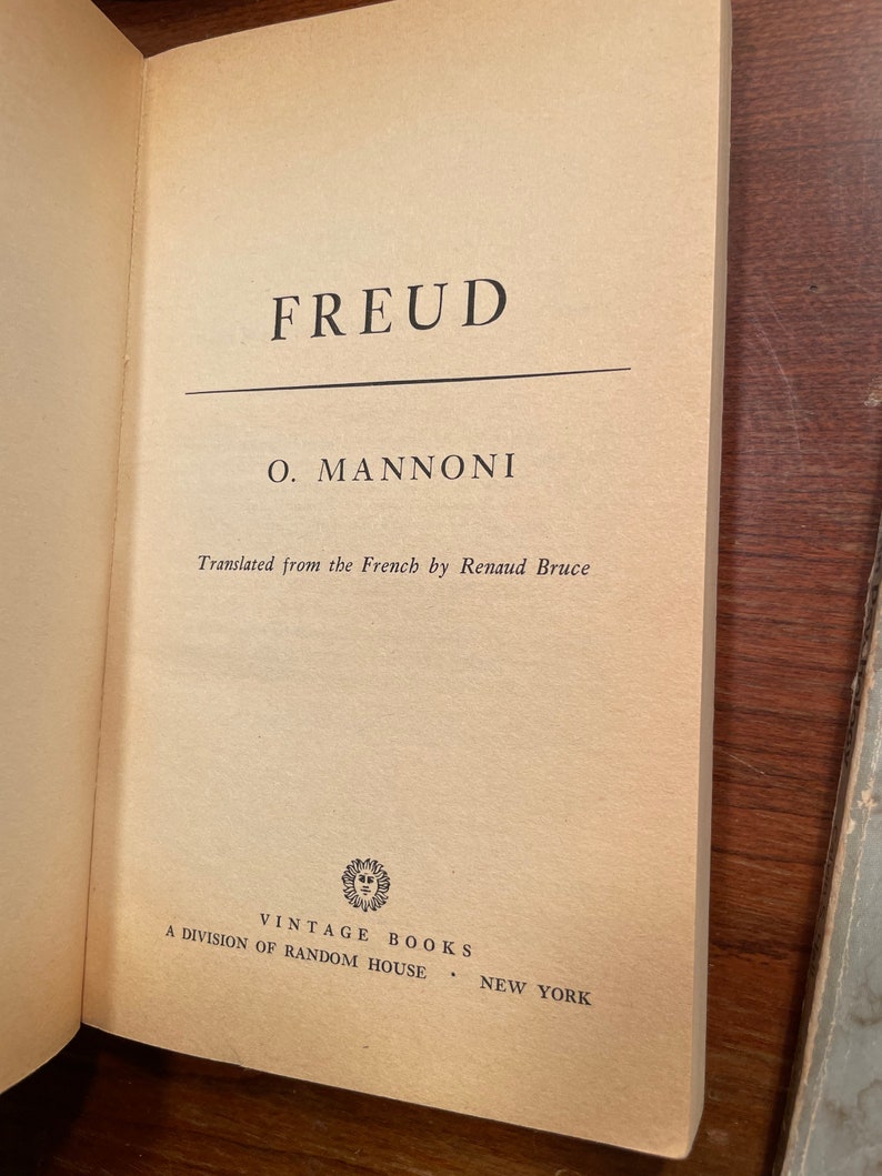 May include: A vintage book cover with the title "FREUD" by O. MANNONI. The book is translated from the French by Renaud Bruce and published by Vintage Books, a division of Random House, New York.
