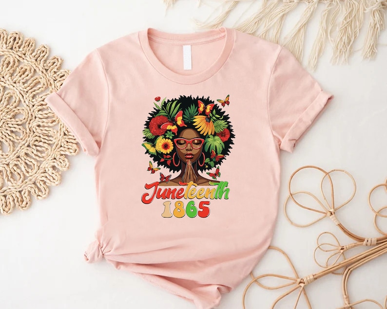 a t - shirt with a woman's face and flowers on it