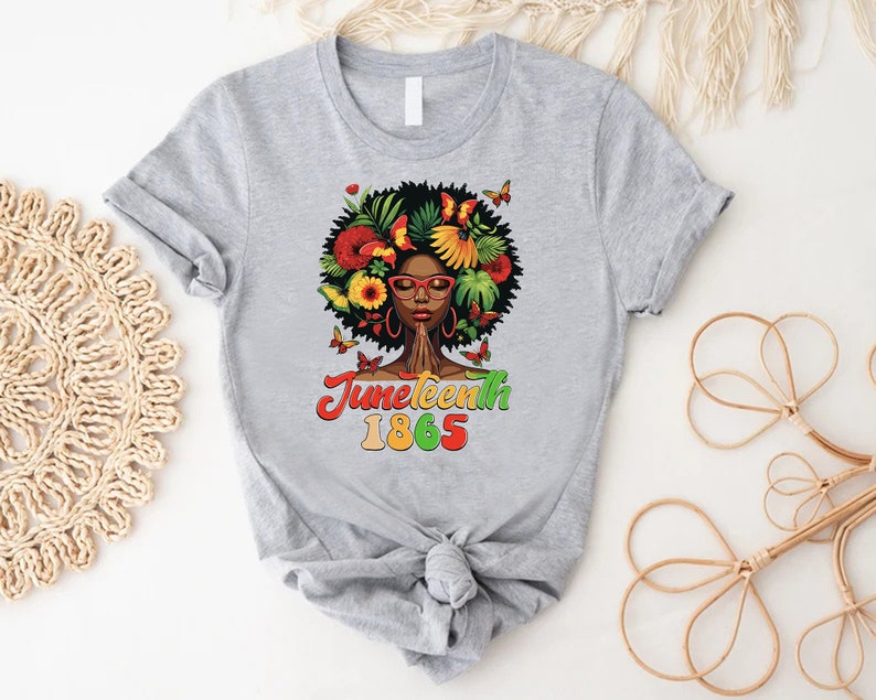 a t - shirt with a picture of a woman with flowers on it