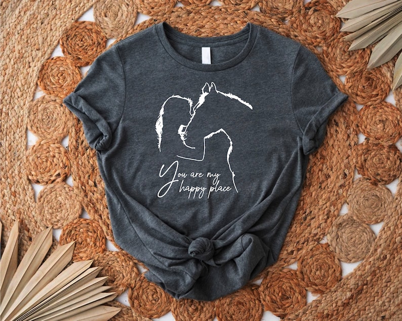 a t - shirt with a horse drawn on it
